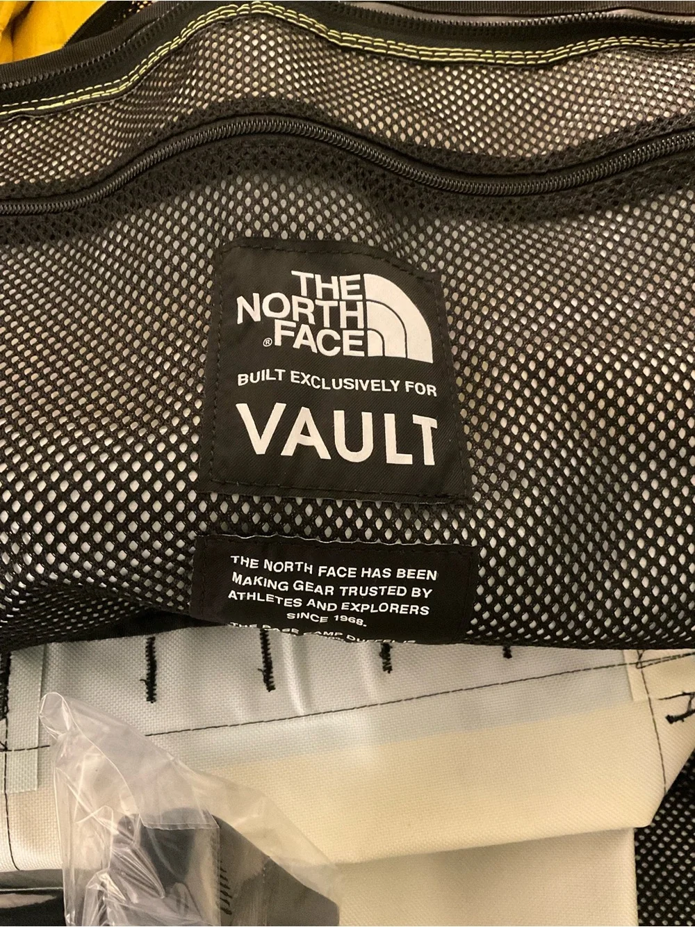 The North Face Yellow & Teal Striped Duffel Bag